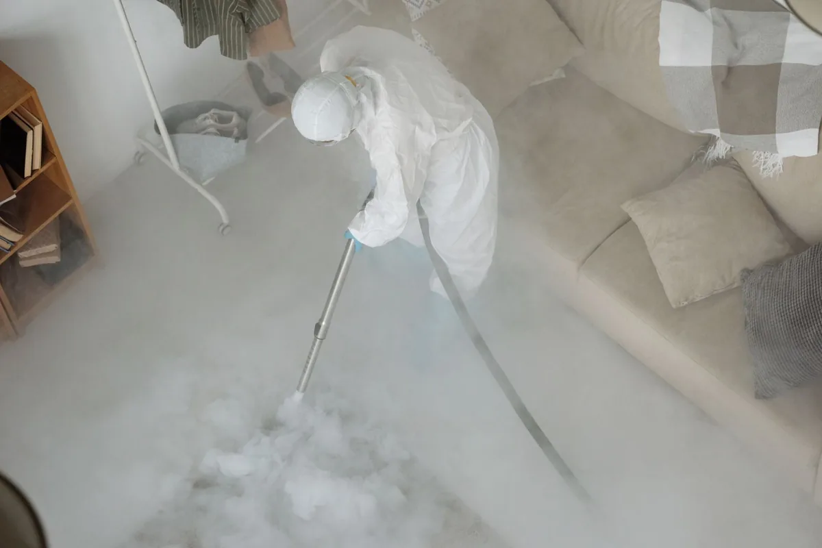 Biohazard cleanup technician in protective equipment, Chewelah, WA